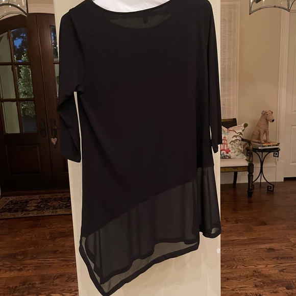 Elegant black knit blouse with sheer bottom. - Picture 2 of 3
